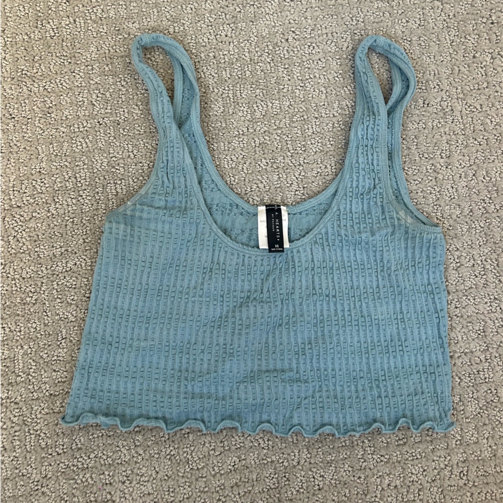 passing blue tank top